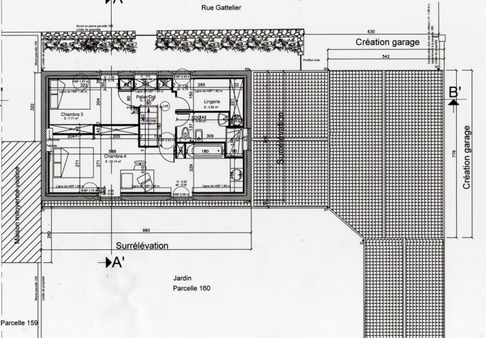 Surlvation d'une maison et construction d'un garage : Plan tage 